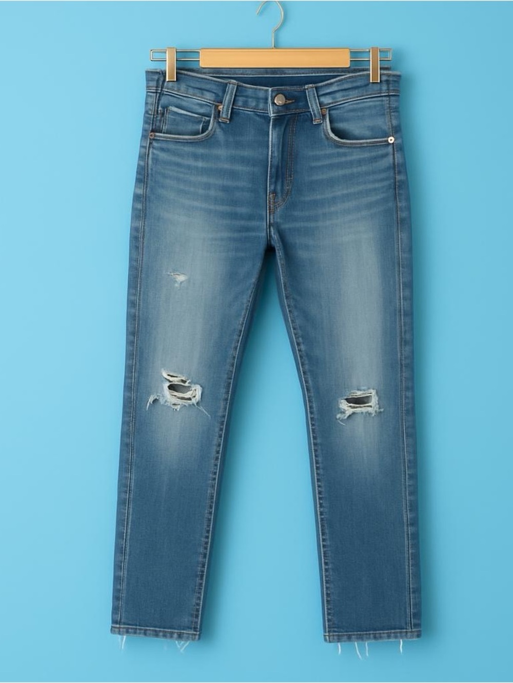 Frame Denim Women's Skinny Jeans in Medium Blue Wash with Light Distressing
